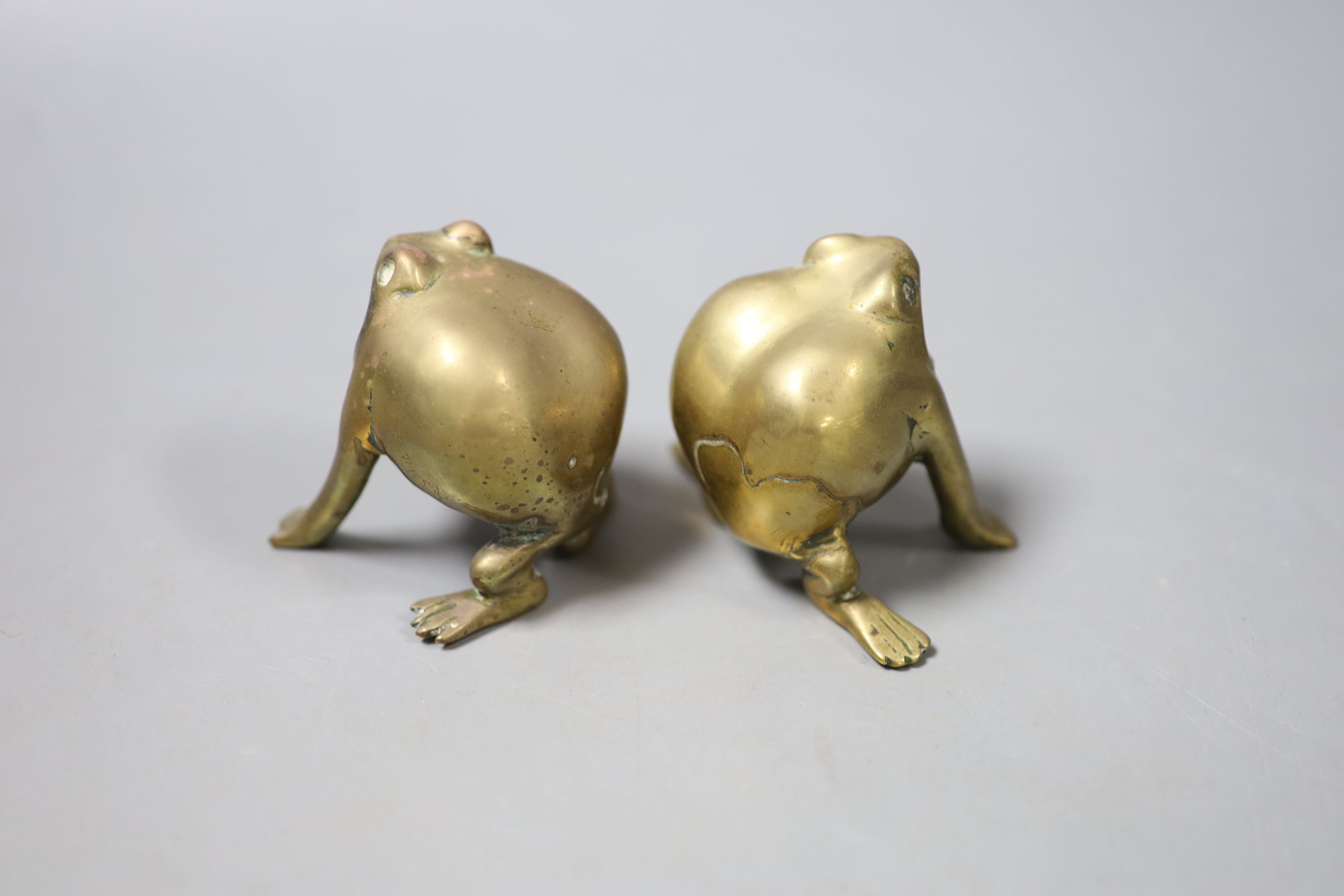 A pair of Chinese small bronze censers, in the form of toads with open mouths, height 7cm